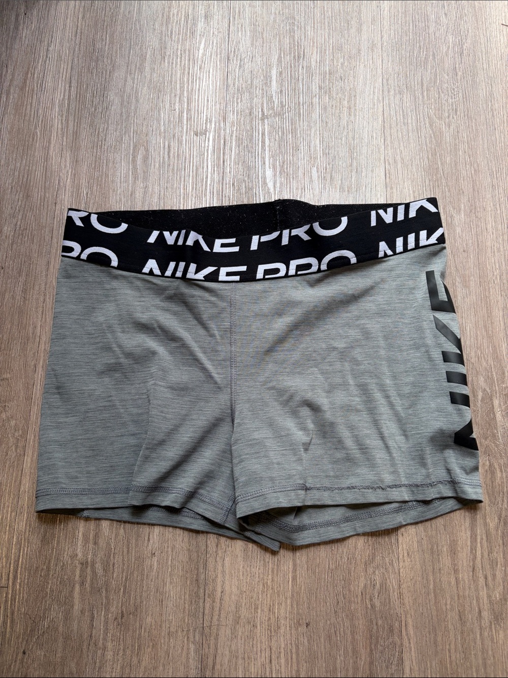 Nike Women's Heather Gray Athletic Shorts with Black Branded Waistband